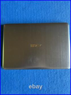 Ordinateur Asus E403S pas de signe de casse esthétique grade A HORS SERVICE