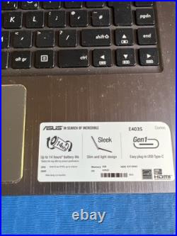 Ordinateur Asus E403S pas de signe de casse esthétique grade A HORS SERVICE